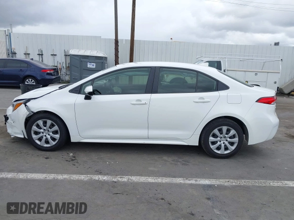 2023 Toyota Corolla Hybrid LE with VIN JTDBCMFE3PJ010097, listed as a IAAI auction lot 41786656 with 50,775 mi miles. Bid and sale history available at carsss.com. Image 14.