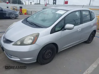 2013 Honda Fit with VIN JHMGE8H38DC002109, listed as a IAAI auction lot 42067257 with 305,739 mi miles. Bid and sale history available at carsss.com. Image 2.