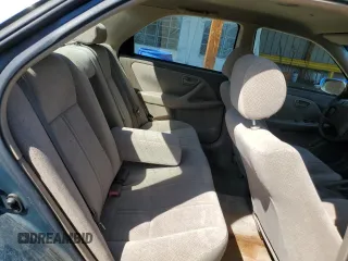 2001 Toyota Camry CE z VIN JT2BG22K410538709, wystawiony jako Copart lot #53295905 z przebiegiem 223 115 mil mil oraz Szkoda całkowita • Salvage title. Historia ofert i sprzedaży dostępna na DreamBid. Obrazek 10.