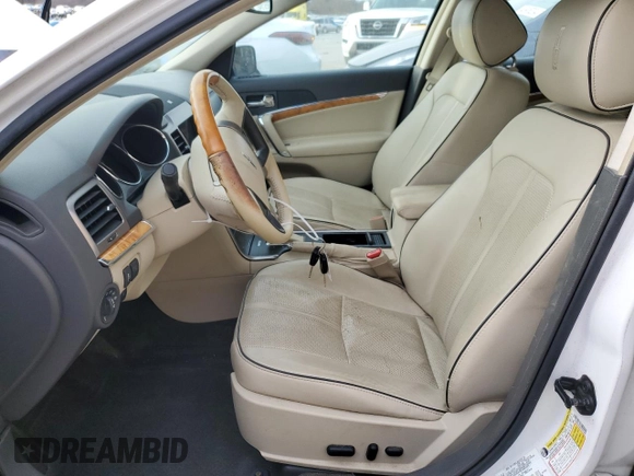 2012 Lincoln MKZ with VIN 3LNHL2GC8CR824902, listed as a Copart auction lot 41517744 with 166,074 mi miles and Salvage Title. Bid and sale history available at DreamBid. Image 7.