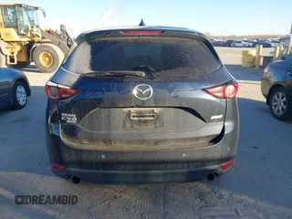 2019 Mazda CX-5 Signature with VIN JM3KFBEY5K0656965, listed as a IAAI auction lot 41421453 with 99,073 mi miles. Bid and sale history available at carsss.com. Image 16.