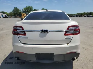 2015 Ford Taurus SEL z VIN 1FAHP2E82FG108442, wystawiony jako Copart lot #57790515 z przebiegiem 116 834 mil mil oraz Szkoda całkowita • Salvage title. Historia ofert i sprzedaży dostępna na DreamBid. Obrazek 6.