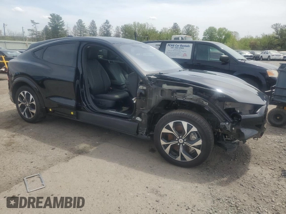 2023 Ford Mustang Mach-E Premium with VIN 3FMTK3SUXPMA74148, listed as a Copart auction lot 54856295 with 5,469 mi miles and Salvage Title. Bid and sale history available at DreamBid. Image 4.