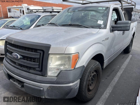 2014 Ford F-150 XL with VIN 1FTMF1CM6EKD55559, listed as a IAAI auction lot 42165710 with 270,953 mi miles. Bid and sale history available at carsss.com. Image 1.