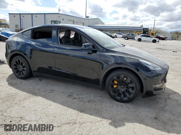 2021 Tesla Model Y Long Range with VIN 5YJYGDEEXMF188737, listed as a Copart auction lot 49117605 with 49,201 mi miles and Salvage Title. Bid and sale history available at DreamBid. Image 4.