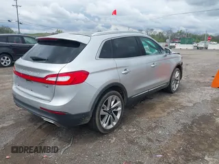 2016 Lincoln MKX Reserve with VIN 2LMPJ8LP8GBL84279, listed as a IAAI auction lot 41900294 with 70,958 mi miles. Bid and sale history available at carsss.com. Image 4.