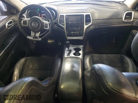 2012 Jeep Grand Cherokee SRT8 with VIN 1C4RJFDJ2CC105829, listed as a Copart auction lot 51840385 with 142,146 mi miles and Clean Title. Bid and sale history available at carsss.com. Image 8.