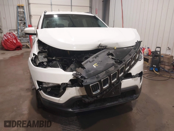 2018 Jeep Compass Altitude with VIN 3C4NJDBB2JT373179, listed as a IAAI auction lot 41753934 with 47,230 mi miles and . Bid and sale history available at DreamBid. Image 6.