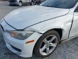 2014 BMW 3 Series 320i with VIN WBA3B1G59ENS78532, listed as a IAAI auction lot 41627172 with 133,049 mi miles. Bid and sale history available at carsss.com. Image 6.