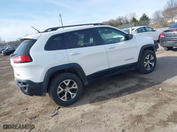 2015 Jeep Cherokee Trailhawk with VIN 1C4PJMBS9FW648525, listed as a IAAI auction lot 41742008 with 109,462 mi miles. Bid and sale history available at carsss.com. Image 4.