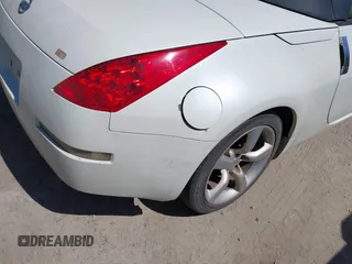 2006 Nissan 350Z Touring with VIN JN1AZ36A96M452478, listed as a IAAI auction lot 41843993 with 211,567 mi miles. Bid and sale history available at carsss.com. Image 6.