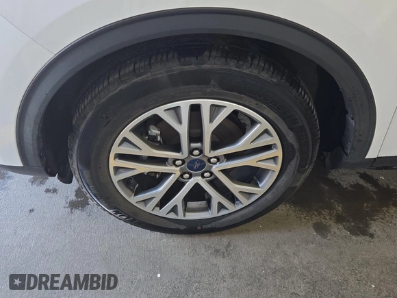 2021 Ford Escape SEL Hybrid with VIN 1FMCU9CZ1MUB25597, listed as a IAAI auction lot 42663573 with 79,061 mi miles and . Bid and sale history available at DreamBid. Image 24.