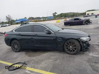 2016 BMW 4 Series 428i xDrive with VIN WBA4C9C58GG136248, listed as a IAAI auction lot 41346270 with 129,464 mi miles and . Bid and sale history available at carsss.com. Image 14.