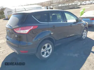 2015 Ford Escape SE with VIN 1FMCU9GX2FUB68101, listed as a IAAI auction lot 41902379 with 136,248 mi miles. Bid and sale history available at carsss.com. Image 4.