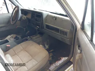 1996 Jeep Cherokee Sport with VIN 1J4FJ68S7TL263437, listed as a IAAI auction lot 42513022 with 158,561 mi miles and . Bid and sale history available at DreamBid. Image 5.
