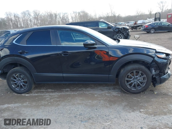 2022 Mazda CX-30 S with VIN 3MVDMBALXNM402265, listed as a IAAI auction lot 41458605 with 76,291 mi miles and . Bid and sale history available at carsss.com. Image 13.