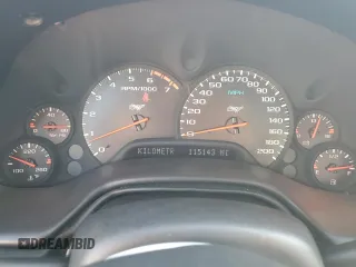 2003 Chevrolet Corvette with VIN 1G1YY22G435133247, listed as a Copart auction lot 85730074 with 115,143 mi miles and Salvage Title. Bid and sale history available at carsss.com. Image 9.