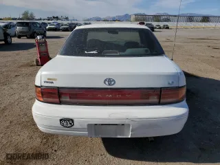 1992 Toyota Camry LE with VIN 4T1SK12E0NU064956, listed as a Copart auction lot 50665925 with 228,909 mi miles and Salvage Title. Bid and sale history available at carsss.com. Image 6.