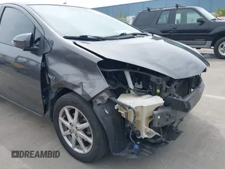 2013 Toyota Prius One with VIN JTDKDTB34D1047568, listed as a IAAI auction lot 41950373 with 99,319 mi miles and . Bid and sale history available at carsss.com. Image 6.