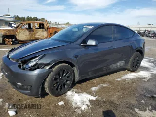 2021 Tesla Model Y Standard Range with VIN 5YJYGDED5MF112740, listed as a Copart auction lot 89188825 with 99,991 mi miles and Salvage Title. Bid and sale history available at carsss.com. Image 1.