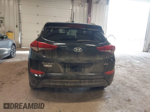2017 Hyundai Tucson SE with VIN KM8J3CA42HU293608, listed as a IAAI auction lot 41228892 with 140,229 mi miles. Bid and sale history available at carsss.com. Image 16.