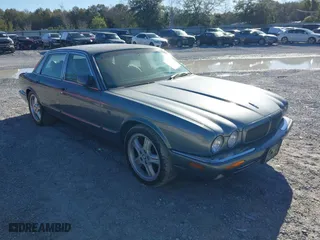 2002 Jaguar XJ with VIN SAJDA12C02LF45939, listed as a IAAI auction lot 41731597 with 162,791 mi miles. Bid and sale history available at carsss.com. Image 1.