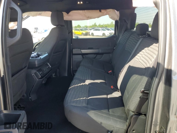 2023 Ford F-150 XL with VIN 1FTEW1CP4PKD21685, listed as a Copart auction lot 54992615 with 27,252 mi miles and Salvage title. Bid and sale history available at DreamBid. Image 10.