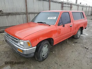 1989 Toyota Pickup DX z VIN JT4RN81P6K5012601, wystawiony jako Copart lot #44075825 z przebiegiem 226 097 mil mil oraz Czysty tytuł • Clean title. Historia ofert i sprzedaży dostępna na DreamBid. Obrazek 1.