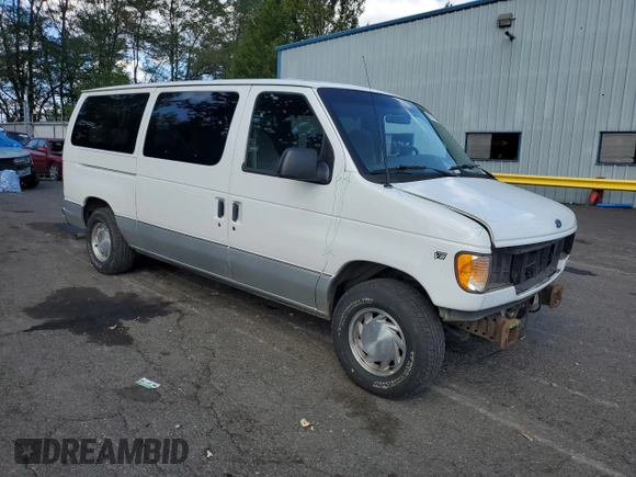 2002 Ford Econoline Passenger XL with VIN 1FMRE11WX2HA57114, listed as a Copart auction lot 68766174 with 167,382 mi miles and Salvage Title. Bid and sale history available at DreamBid. Image 4.