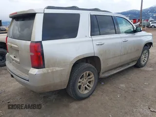 2019 Chevrolet Tahoe LT with VIN 1GNSKBKC7KR175468, listed as a IAAI auction lot 41680274 with 159,155 mi miles and . Bid and sale history available at DreamBid. Image 4.