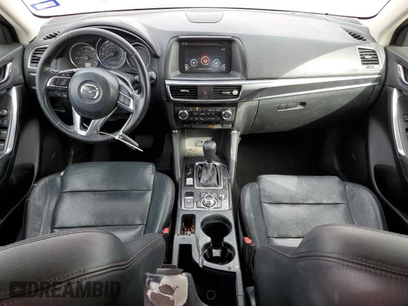 2016 Mazda CX-5 Grand Touring with VIN JM3KE4DY0G0820954, listed as a Copart auction lot 48027785 with 152,448 mi miles and Salvage Title. Bid and sale history available at carsss.com. Image 8.