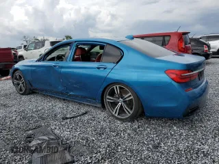 2019 BMW 7 Series 750i z VIN WBA7F0C51KGM25707, wystawiony jako Copart lot #61950495 z przebiegiem 56 768 mil mil oraz Nie do naprawy • Non repairable. Historia ofert i sprzedaży dostępna na DreamBid. Obrazek 2.