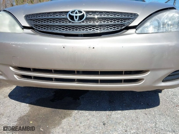 2004 Toyota Camry LE with VIN JTDBE32K740245605, listed as a IAAI auction lot 42068674 with 166,581 mi miles. Bid and sale history available at carsss.com. Image 13.