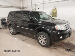 2009 Honda Pilot Touring with VIN 5FNYF48939B041166, listed as a IAAI auction lot 42098397 with 228,305 mi miles and . Bid and sale history available at carsss.com. Image 1.