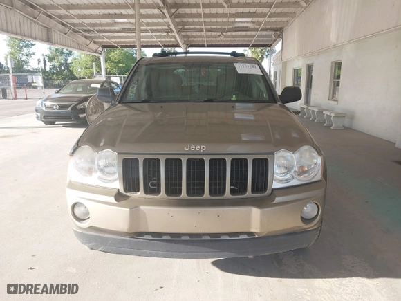 2005 Jeep Grand Cherokee Laredo with VIN 1J8HR48N95C713185, listed as a IAAI auction lot 41777242 with 95,262 mi miles. Bid and sale history available at carsss.com. Image 12.