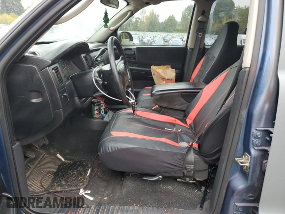 2003 Dodge Dakota Sport with VIN 1D7HL38N63S192308, listed as a Copart auction lot 77494684 with 128,512 mi miles and Salvage Title. Bid and sale history available at carsss.com. Image 7.