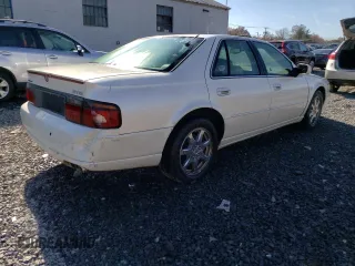 2002 Cadillac Seville Touring STS z VIN 1G6KY54922U151685, wystawiony jako Copart lot #78251854 z przebiegiem Nie podano mil oraz Szkoda całkowita • Salvage title. Historia ofert i sprzedaży dostępna na DreamBid. Obrazek 3.