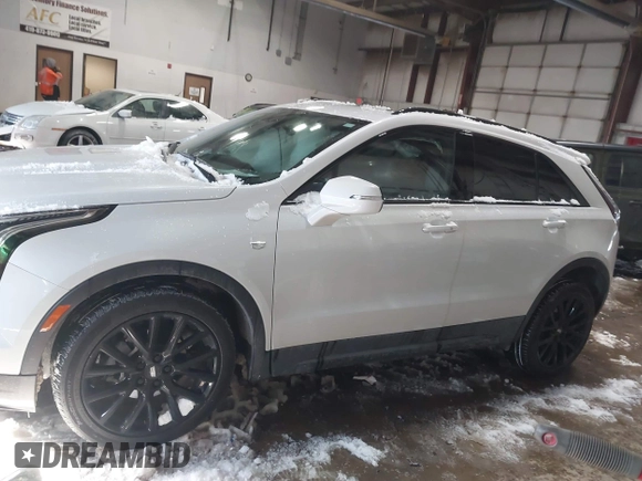 2023 Cadillac XT4 AWD Sport with VIN 1GYFZFR42PF111269, listed as a IAAI auction lot 41614455 with 21,866 mi miles. Bid and sale history available at carsss.com. Image 14.