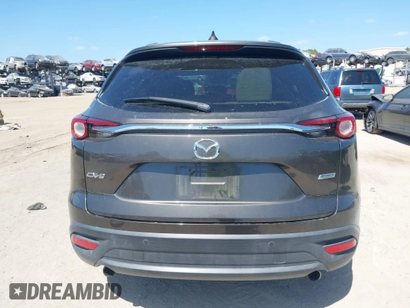 2019 Mazda CX-9 Touring with VIN JM3TCACY9K0304899, listed as a IAAI auction lot 42167180 with 57,043 mi miles and . Bid and sale history available at DreamBid. Image 16.
