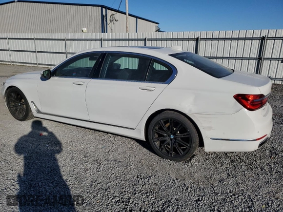 2017 BMW 7 Series 740i with VIN WBA7E2C32HG740649, listed as a Copart auction lot 45593145 with 122,793 mi miles and Salvage Title. Bid and sale history available at carsss.com. Image 2.