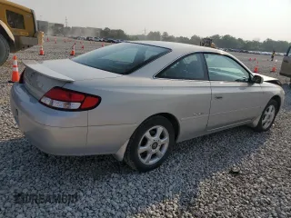 2000 Toyota Solara SE z VIN 2T1CF28P5YC267645, wystawiony jako Copart lot #60543605 z przebiegiem 58 938 mil mil oraz Szkoda całkowita • Salvage title. Historia ofert i sprzedaży dostępna na DreamBid. Obrazek 3.
