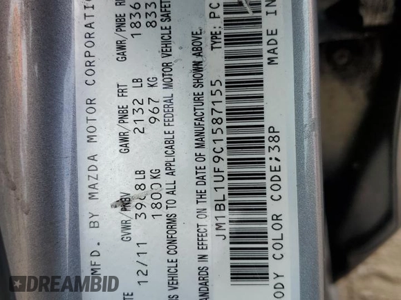 2012 Mazda 3 i Sport z VIN JM1BL1UF9C1587155, wystawiony jako Copart lot #59013105 z przebiegiem 188 233 mil mil oraz Szkoda całkowita • Salvage title. Historia ofert i sprzedaży dostępna na DreamBid. Obrazek 12.