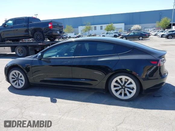 2021 Tesla Model 3 Long Range with VIN 5YJ3E1EB4MF064631, listed as a IAAI auction lot 41424856 with 95,511 mi miles and . Bid and sale history available at DreamBid. Image 14.