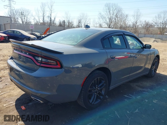 2019 Dodge Charger SXT with VIN 2C3CDXJG0KH523723, listed as a IAAI auction lot 41774826 with 110,596 mi miles and . Bid and sale history available at DreamBid. Image 4.