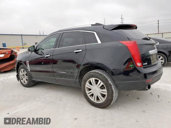 2016 Cadillac SRX Luxury Collection with VIN 3GYFNBE33GS513010, listed as a Copart auction lot 53452665 with 83,811 mi miles and Salvage title. Bid and sale history available at DreamBid. Image 2.