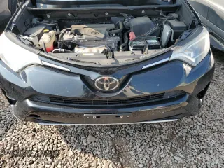 2018 Toyota RAV4 XLE with VIN 2T3RFREV0JW765995, listed as a Copart auction lot 63968785 with 114,598 mi miles and Salvage title. Bid and sale history available at DreamBid. Image 12.
