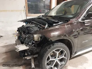 2016 BMW X1 xDrive28i with VIN WBXHT3C33GP886935, listed as a IAAI auction lot 41707367 with 73,201 mi miles. Bid and sale history available at carsss.com. Image 19.