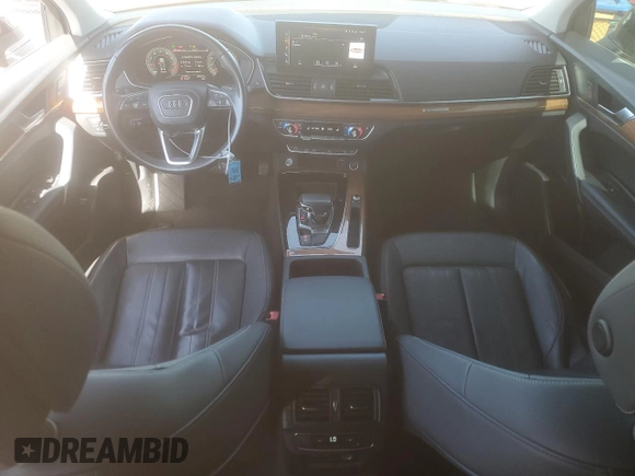 2021 Audi Q5 Premium Plus with VIN WA1BAAFYXM2015246, listed as a Copart auction lot 61257785 with 61,407 mi miles and Salvage title. Bid and sale history available at DreamBid. Image 8.