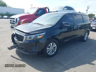 2015 Kia Sedona LX with VIN KNDMB5C17F6069139, listed as a IAAI auction lot 42064125 with 226,244 mi miles and . Bid and sale history available at DreamBid. Image 2.