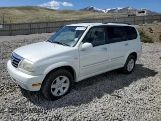2003 Suzuki XL7 Touring z VIN JS3TX92V034109417, wystawiony jako Copart lot #52672475 z przebiegiem 96 760 mil mil oraz Szkoda całkowita • Salvage title. Historia ofert i sprzedaży dostępna na DreamBid. Obrazek 1.